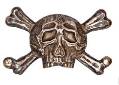 A Brunswick cavalry officer’s base metal skull and crossbones sabretache badge, 5 pairs copper