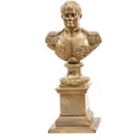 A cast brass bust of Napoleon, in full dress without headdress, on integral round base, and square