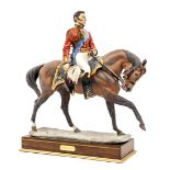 A Worcester Royal Porcelain Company figure of The Duke of Wellington, in full dress, mounted on