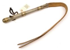 An Eastern European (?) riding crop or whip, the spiral handle and mouth of white metal with bands