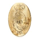 A brass shoulder belt plate of The 60th (Royal American) Regiment, of slightly rounded oval form,