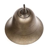 A small bell, of bell metal with iron clapper, diameter 2½” (chipped at rim, not affecting sound),