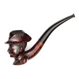 A good carved darkwood tobacco pipe, c 1900, in the form of a soldier’s head wearing slouch hat