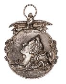A heavy silver medallion commemorating the death of Napoleon, bearing the Emperor’s laurel crowned