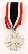 A Third Reich silver plated Knights Cross of the War Merit Cross, with ribbon. New Condition