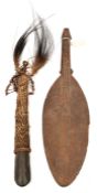 A New Guinea Sepik River carved hardwood pottery making paddle, 15½” overall, (small chip to one