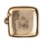 A 9 carat gold vesta case, 1¾” x 1¾”, HM B&S Ltd B’ham 1922,with later applied engraved badge of the