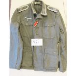A German Army M1940 Infantry NCO’s summer tunic, of good quality field grey material, with silver