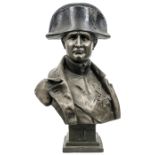 A hollow cast half length bust of Napoleon,  wearing bicorne hat and coat with sash and medals,