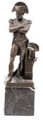 A bronzed figure of Napoleon, in full dress coatee and bicorne hat, with sword at his waist,