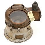 A small compass binnacle,  brass top with handle, viewing panel and extension which houses a small