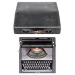 A good quality German Third Reich period Olympia Plana portable typewriter,  the keyboard