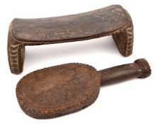 A New Guinea Sepik River hardwood headrest,  with simple carved decoration; and a similar wooden