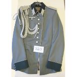 A German Army officer’s tunic,  with white piping to collar and cuffs white backing to shoulder