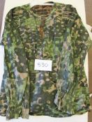 A German Waffen SS M1942 reversible camouflage smock,  in scarce “blurred” pattern material, one