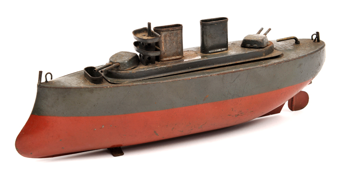 An unusual early 20th Century style Sutcliffe two funnelled ‘Putt-Putt’ powered battleship.