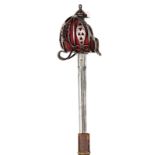 A WWI Highland officer’s service broadsword, blade 33” with Royal Arms and maker’s escutcheon at