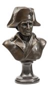 A bronze head and shoulders bust of Napoleon, wearing bicorne hat and cloak, incorporating signature
