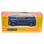 Corgi Whizzwheels Morris Mini Minor (204). In metallic blue with yellow interior. Boxed. Vehicle