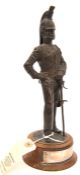 A well modelled standing bronzed composition figure “Bombay Horse Artillery c 1844”, in full dress