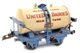 Hornby Series O gauge tank wagon. United Dairies Glass Lined Milk Tank in white and blue livery. (