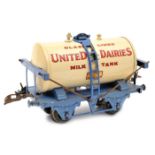 Hornby Series O gauge tank wagon. United Dairies Glass Lined Milk Tank in white and blue livery. (