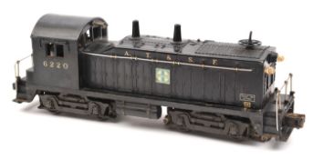 A Lionel O gauge 3-rail electric AT&SF Bo-Bo diesel locomotive. RN 6220 in unlined black livery with