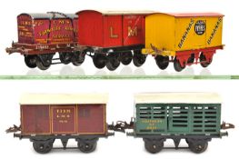 11 Hornby Series O gauge wagons. LMS Fish Van, LMS Gunpowder Van, Southern Milk Traffic van, GN