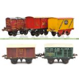 11 Hornby Series O gauge wagons. LMS Fish Van, LMS Gunpowder Van, Southern Milk Traffic van, GN