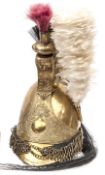 A French dragoon’s brass helmet, c 1830, tall brass skull with front and back peaks, leather