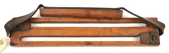 A wooden 2 row game carrier, by James Dixon & Sons, Sheffield, with sprung hinged brass and covers