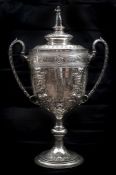 An impressive cricket presentation 2 handled silver cup, Hallmarked 1893, “Presented to W.P. Jones