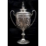 An impressive cricket presentation 2 handled silver cup, Hallmarked 1893, “Presented to W.P. Jones