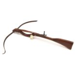 A replica crossbow in the 18th century style, 32” overall, span of steel bow 32”, with top thumb