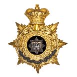 A Victorian officer’s gilt and silver plated helmet plate of The East Surrey Regiment, velvet centre