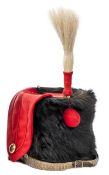 A continental Hussar trooper’s black fur busby,  scarlet busby bag with red braid tracing and