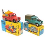 2 Corgi Toys. Land Rover  109" W.B. (438). In metallic green with dark green rear tonneau and yellow