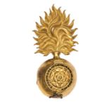 A Victorian officer’s gilt bearskin grenade badge of The Royal Fusiliers (City of London