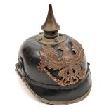 A similar Prussian pickelhaube, the inside of the skull with size only. Basically GC (no rosette