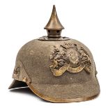 A Bavarian ersatz felt pickelhaube, the one piece skull with brass mounts (including rim to peak)