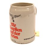 A German ½ litre stoneware beer stein,  with transfer printed Luftwaffe eagle over “Wir Kampften auf