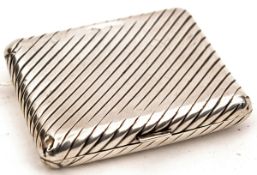 A Continental silver cigarette case,  with diagonally fluted decoration and “900” silver marks,