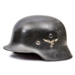 A Third Reich M40 single decal Luftwaffe steel helmet,  the dark grey/black finish with 2nd type