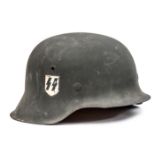 A Third Reich M42 Waffen SS steel helmet, matt grey finish with 2nd type SS decal, later worn type