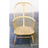 An Ercol light elm and beech Windsor chair. H102cm