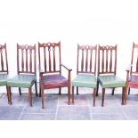 A set of six Edwardian Art Nouveau style mahogany dining chairs