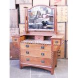 An Arts and Crafts dressing table. Numbered 341 7289 165