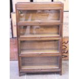 An oak sectional bookcase circa 1920. W87cm D29cm H146cm