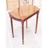 An Edwardian mahogany occasional table. H68cm