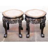 A pair of Chinese carved hardwood and marble top stands. H46cm